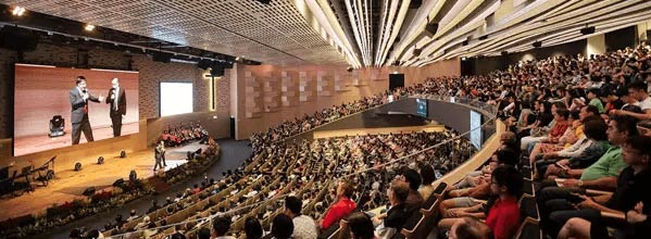 Grace Assembly of God’s main sanctuary filled with worshippers, enhanced by Powersoft K and M Series amplifiers for a powerful and immersive worship experience.